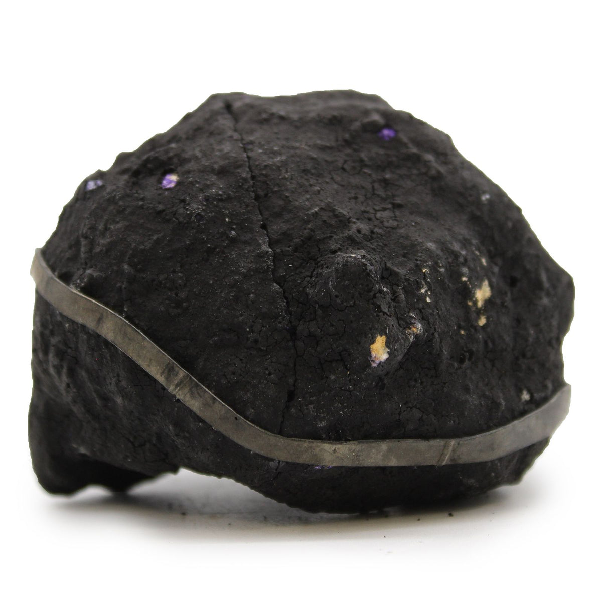 Purple Coloured Calcite Geode on Black Rock