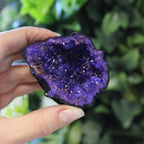 Blue Coloured Calcite Geode on Black Rock