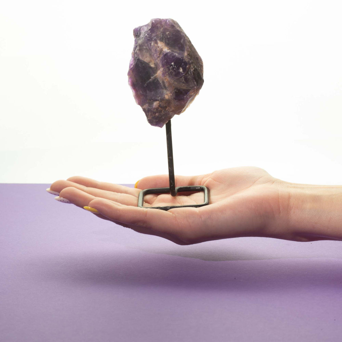 Amethyst Mineral Specimen on Metal Stand