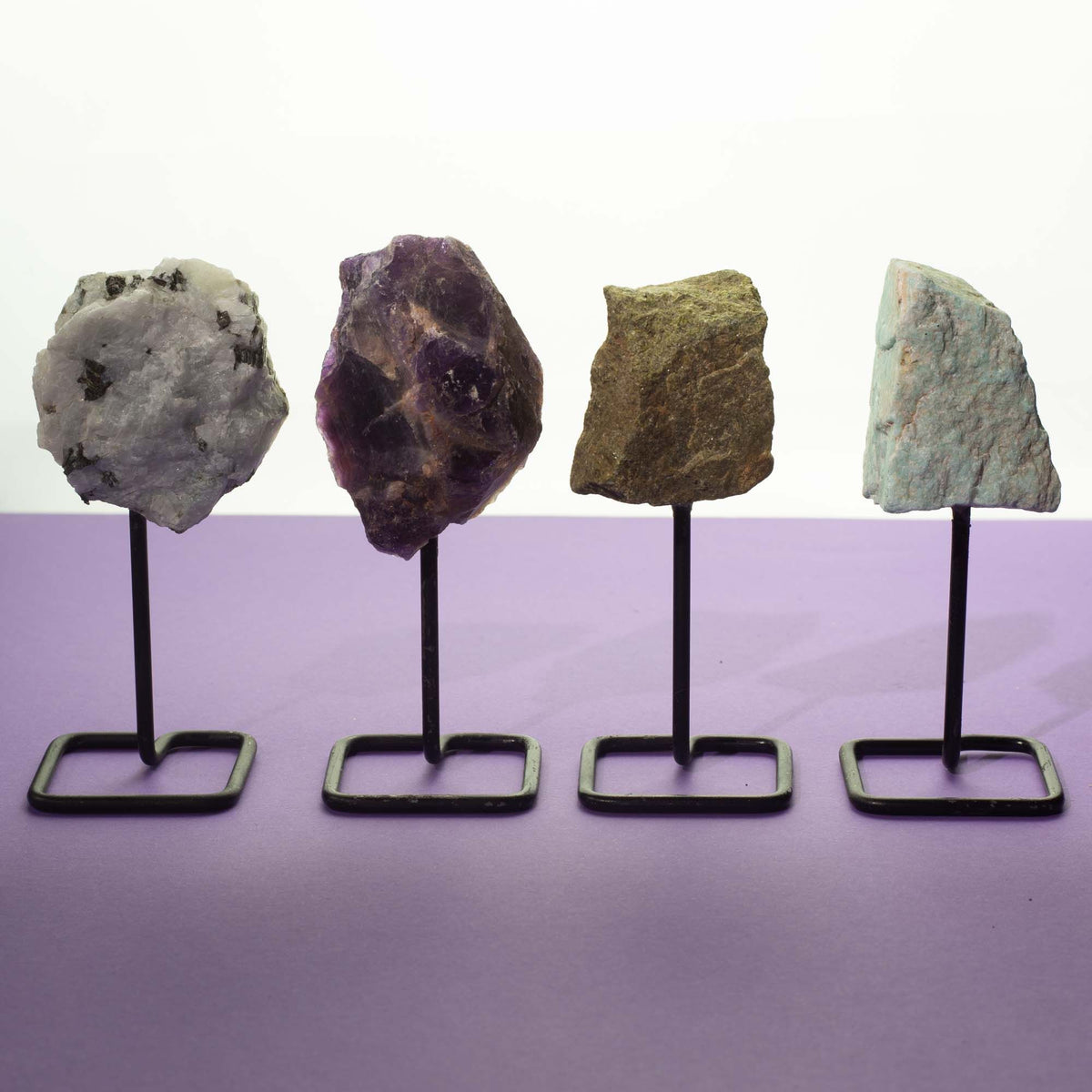 Amethyst Mineral Specimen on Metal Stand